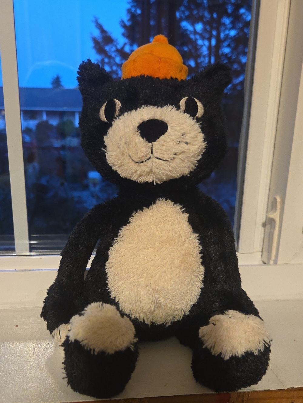 Jellycat Black Plush Cat with Cream Accents and Orange Knit Hat